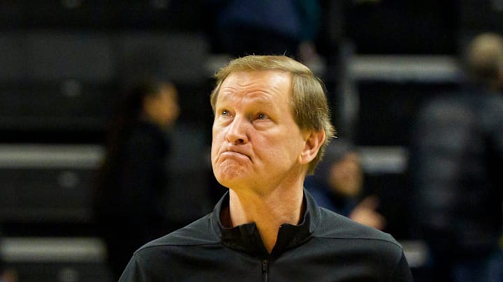 Oregon head coach Dana Altman looks toward the scoreboard as he walks off the court as the Oregon Ducks host the Minnesota Golden Gophers on Feb. 17, 2026, at Matthew Knight Arena in Eugene, Oregon.