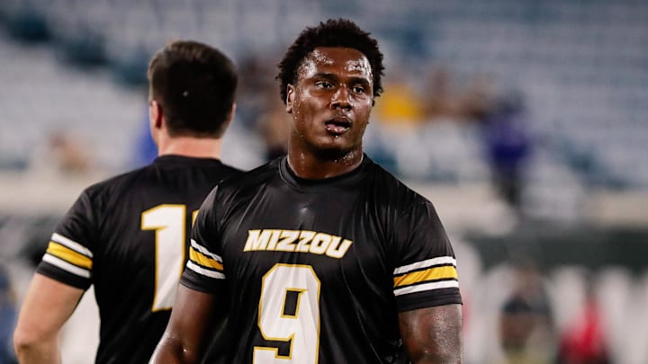Dec 27, 2025; Jacksonville, FL, USA; Missouri Tigers defensive end Zion Young (9) warms up before the Gator Bowl against the Virginia Cavaliers at EverBank Stadium. Mandatory Credit: Travis Register-Imagn Images