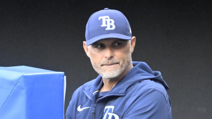 Aug 26, 2025; Cleveland, Ohio, USA; Tampa Bay Rays manager Kevin Cash (16) stands in the dugout in the first inning against the Cleveland Guardians at Progressive Field. 