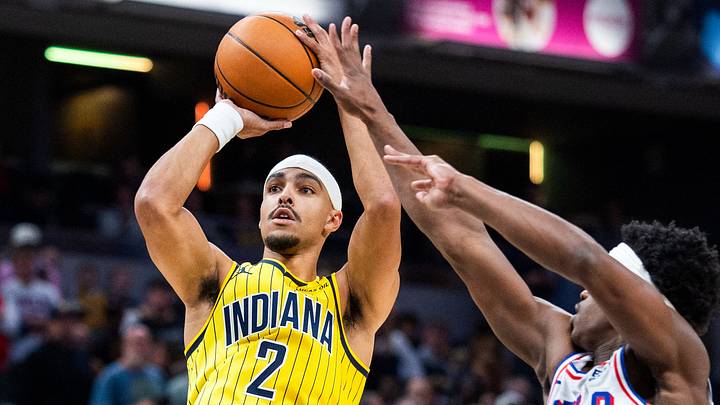 Oct 28, 2026; Indianapolis, Indiana, USA;  Indiana Pacers guard Andrew Nembhard (2) shoots the ball while Philadelphia 76ers guard Vj Edgecombe (77) defends in the first half at Gainbridge Fieldhouse.  Mandatory Credit: Trevor Ruszkowski-Imagn Images
