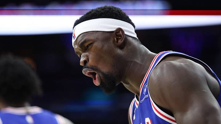 Jan 5, 2026; Philadelphia, Pennsylvania, USA; Philadelphia 76ers center Adem Bona (30) reacts to a defensive stop against the Denver Nuggets during the fourth quarter at Xfinity Mobile Arena. 