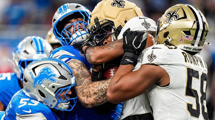 Detroit Lions LB Trevor Nowaske (53) and DE Eric O'Neill (66) tackle New Orleans Saints returner Barion Brown Detroit Lions LB Trevor Nowaske (53) and DE Eric O'Neill (66) tackle New Orleans Saints returner Barion Brown