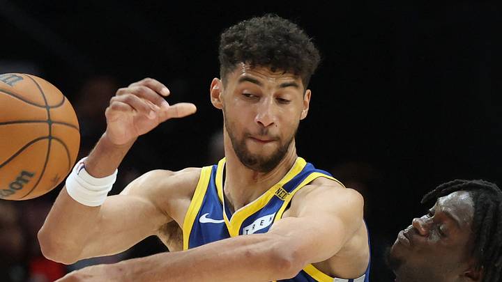 Oct 7, 2026; Portland, Oregon, USA;  Portland Trail Blazers guard Sidy Cissoko (91) defends Golden State Warriors forward Malevy Leons (33) during the second half at Moda Center.  Mandatory Credit: Jaime Valdez-Imagn Images
