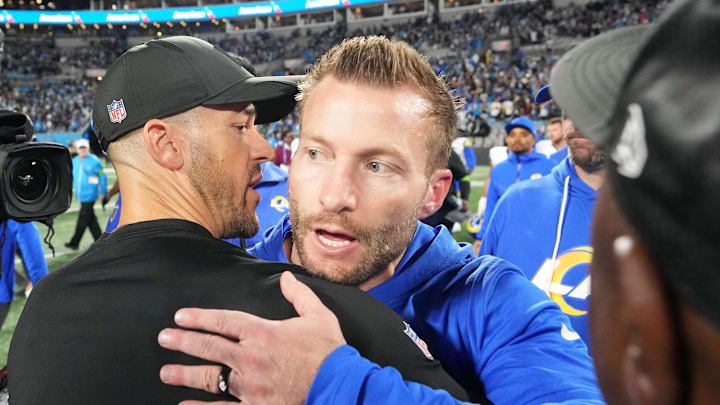 Jan 10, 2026; Charlotte, NC, USA; Los Angeles Rams head coach Sean McVay and Carolina Panthers head coach Dave Canales meet after the game in the NFC Wild Card Round game at Bank of America Stadium. Mandatory Credit: Bob Donnan-Imagn Images