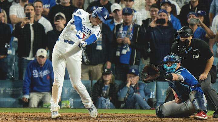 Freddie Freeman makes contact with the walk-off home run that won Game 3.