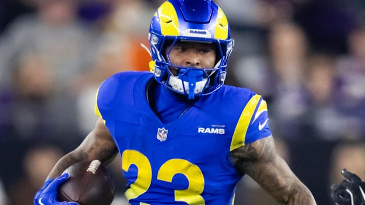 Jan 13, 2025; Glendale, AZ, USA; Los Angeles Rams running back Kyren Williams (23) against the Minnesota Vikings during an NFC wild card game at State Farm Stadium. Mandatory Credit: Mark J. Rebilas-Imagn Images