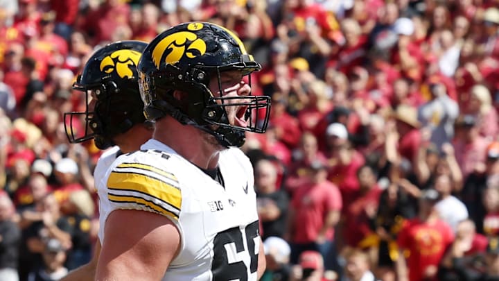 Sep 6, 2025; Ames, Iowa, USA; Iowa Hawkeyes offensive lineman Logan Jones (65) reacts after a play against the Iowa State Cyclones during the second half at Jack Trice Stadium. Mandatory Credit: Reese Strickland-Imagn Images Sep 6, 2025; Ames, Iowa, USA; Iowa Hawkeyes offensive lineman Logan Jones (65) reacts after a play against the Iowa State Cyclones during the second half at Jack Trice Stadium. Mandatory Credit: Reese Strickland-Imagn Images
