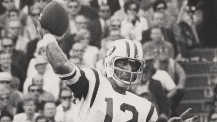 Jan 12, 1969; Miami, FL, USA; FILE PHOTO; New York Jets quarterback (12) Joe Namath throws a pass against the Baltimore Colts during Super Bowl III at the Orange Bowl. The Jets defeated the Colts 16-7 giving the AFL their first victory over the NFL in the Super Bowl series. 