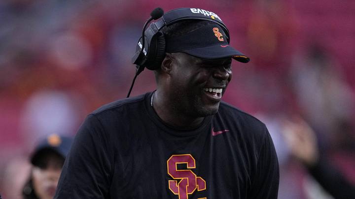 Sep 2, 2023; Los Angeles, California, USA; Southern California Trojans head coach Lincoln Riley (leff) and wide receivers coach Dennis Simmons react against the Nevada Wolf Pack in the second half at United Airlines Field at Los Angeles Memorial Coliseum. Mandatory Credit: Kirby Lee-Imagn Images Sep 2, 2023; Los Angeles, California, USA; Southern California Trojans head coach Lincoln Riley (leff) and wide receivers coach Dennis Simmons react against the Nevada Wolf Pack in the second half at United Airlines Field at Los Angeles Memorial Coliseum. Mandatory Credit: Kirby Lee-Imagn Images