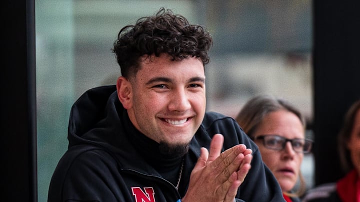 Nov 28, 2025; Lincoln, Nebraska, USA; Nebraska Cornhuskers quarterback Dylan Raiola (15) greets the team as the walk into the stadium before the game against the Iowa Hawkeyes at Memorial Stadium. Mandatory Credit: Dylan Widger-Imagn Images
