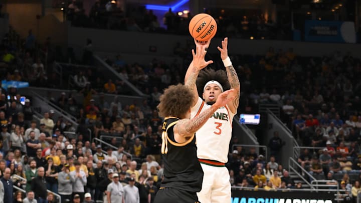 Mar 20, 2026; St. Louis, MO, USA; Miami (FL) Hurricanes guard Tre Donaldson (3) shoots for the basket during the second half against the Missouri Tigers during a first round game of the men's 2026 NCAA Tournament at Enterprise Center. Mandatory Credit: Jeff Curry-Imagn Images Mar 20, 2026; St. Louis, MO, USA; Miami (FL) Hurricanes guard Tre Donaldson (3) shoots for the basket during the second half against the Missouri Tigers during a first round game of the men's 2026 NCAA Tournament at Enterprise Center. Mandatory Credit: Jeff Curry-Imagn Images