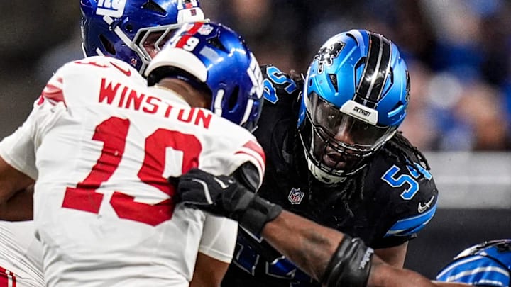 Detroit Lions defensive tackle Alim McNeill (54) tackles New York Giants quarterback Jameis Winston (19)