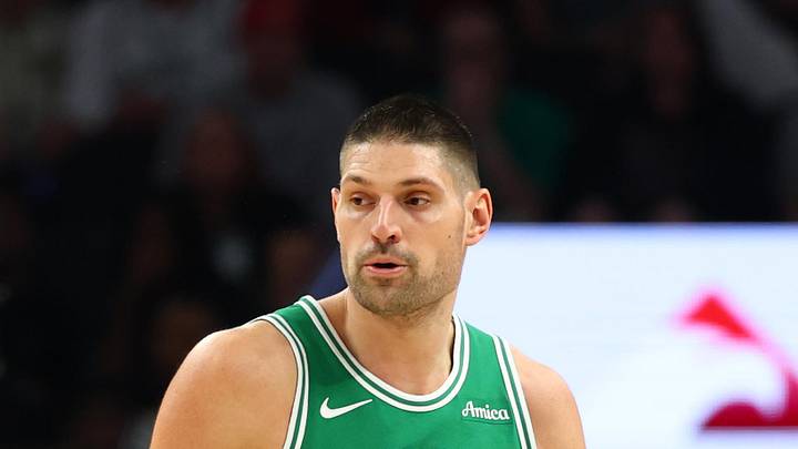 Feb 24, 2026; Phoenix, Arizona, USA; Boston Celtics center Nikola Vucevic (4) against the Phoenix Suns at Mortgage Matchup Center. Mandatory Credit: Mark J. Rebilas-Imagn Images