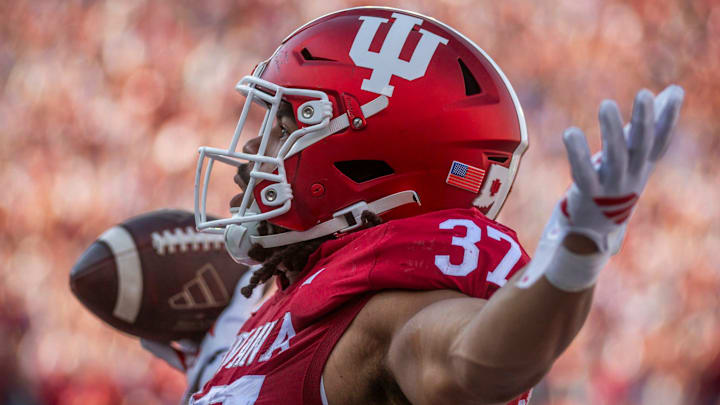Indiana's Riley Nowakowski (37) celebrates a touchdown against Wisconsin at Memorial Stadium.