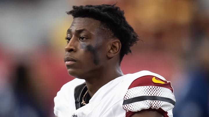 Sep 29, 2024; Glendale, Arizona, USA; Washington Commanders cornerback Emmanuel Forbes Jr. (13) against the Arizona Cardinals at State Farm Stadium. Mandatory Credit: Mark J. Rebilas-Imagn Images