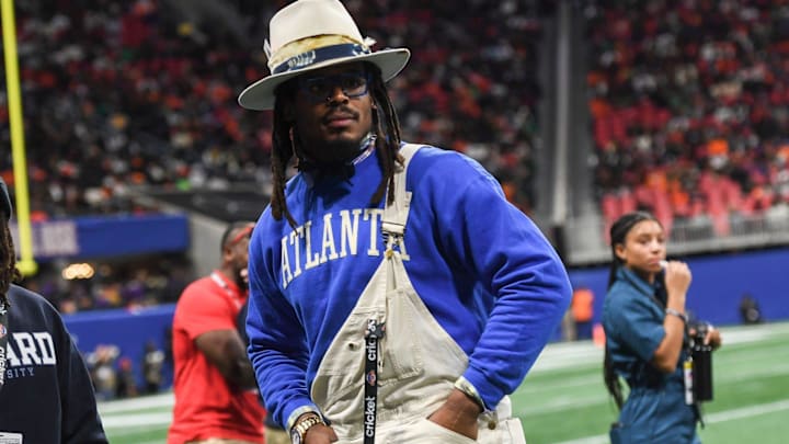 Shedeur Sanders and Travis Hunter made a controversial move when approached by Cam Newton at the UCF game