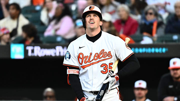 Apr 17, 2025; Baltimore, Maryland, USA;  Baltimore Orioles catcher Adley Rutschman (35) looks toward the crowd after a called strike during the third inning against the Cleveland Guardians at Oriole Park at Camden Yards. Mandatory Credit: James A. Pittman-Imagn Images