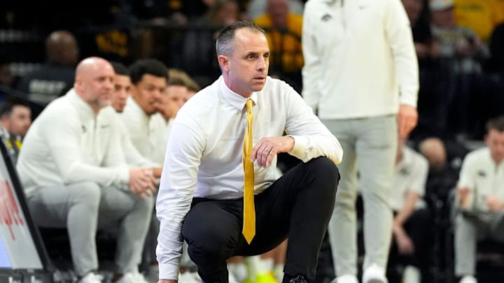 Iowa head coach Ben McCollum watches his team compete against the USC Trojans Jan. 28, 2026 at Carver-Hawkeye Arena in Iowa City, Iowa.