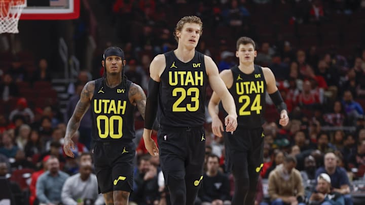 Nov 6, 2023; Chicago, Illinois, USA; Utah Jazz forward Lauri Markkanen (23), Utah Jazz guard Jordan Clarkson (00) and Utah Jazz center Walker Kessler (24) walk on the court during the first half of a basketball game against the Chicago Bulls at United Center. Nov 6, 2023; Chicago, Illinois, USA; Utah Jazz forward Lauri Markkanen (23), Utah Jazz guard Jordan Clarkson (00) and Utah Jazz center Walker Kessler (24) walk on the court during the first half of a basketball game against the Chicago Bulls at United Center.