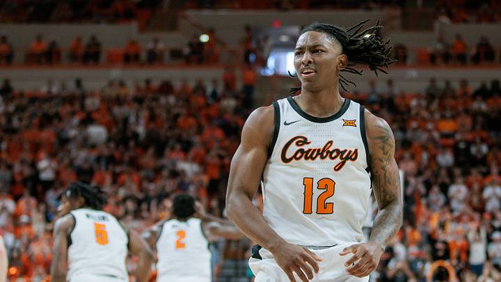 Feb 24, 2024; Stillwater, Oklahoma, USA; Oklahoma State Cowboys guard Javon Small (12) reacts after