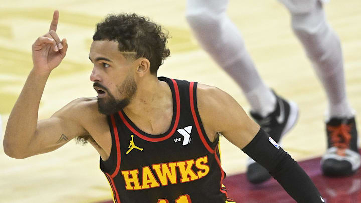 Trae Young #11 of the Atlanta Hawks reacts against the Cleveland Cavaliers.