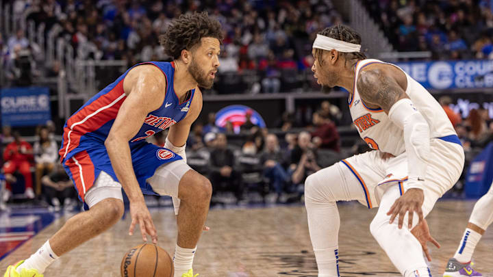 New York Knicks guard Miles McBride (2) defends against Detroit Pistons guard Cade Cunningham (2) New York Knicks guard Miles McBride (2) defends against Detroit Pistons guard Cade Cunningham (2)