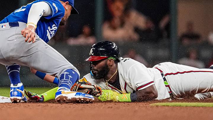 Aug 27, 2026; Cumberland, Georgia, USA; Atlanta Braves center fielder Michael Harris II (23) steals second base past Los Angeles Dodgers second baseman Miguel Rojas (72) during the seventh inning at Truist Park. Mandatory Credit: Dale Zanine-Imagn Images Aug 27, 2026; Cumberland, Georgia, USA; Atlanta Braves center fielder Michael Harris II (23) steals second base past Los Angeles Dodgers second baseman Miguel Rojas (72) during the seventh inning at Truist Park. Mandatory Credit: Dale Zanine-Imagn Images