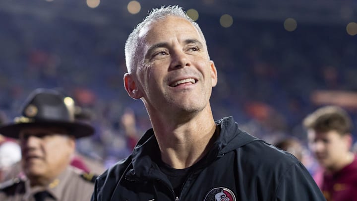 Florida State Seminoles head coach Mike Norvell smiles to the crowd after the game against the Florida Gators at Steve Spurrier Field at Ben Hill Griffin Stadium in Gainesville, FL on Saturday, November 25, 2023. [Matt Pendleton/Gainesville Sun]