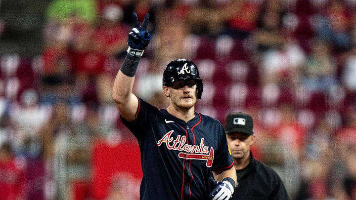 Atlanta Braves catcher Sean Murphy (12) gestures after hitting a RBI double in the eighth inning between Cincinnati Reds and Atlanta Braves at Great American Ball Park in Cincinnati on July 30, 2025.