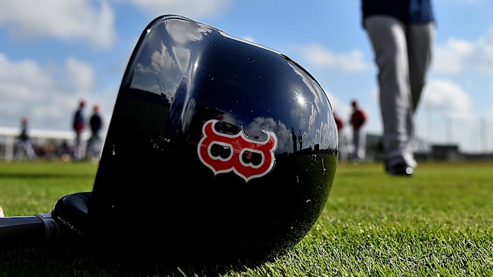 Feb 18, 2019; Lee County, FL, USA; A general view of a Boston Red Sox helmet as Boston Red Sox center fielder Jackie Bradley Jr. (19) walks on the field during a spring training workout at Jet Blue Park at Fenway South. Mandatory Credit: Jasen Vinlove-Imagn Images