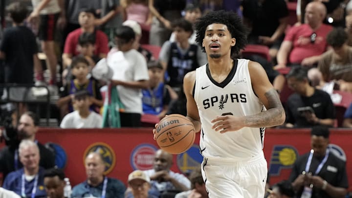 Jul 12, 2025; Las Vegas, NV, USA; San Antonio Spurs guard Dylan Harper (2) dribbles the ball against the Dallas Mavericks in the second quarter of their game at Thomas & Mack Center. Jul 12, 2025; Las Vegas, NV, USA; San Antonio Spurs guard Dylan Harper (2) dribbles the ball against the Dallas Mavericks in the second quarter of their game at Thomas & Mack Center.