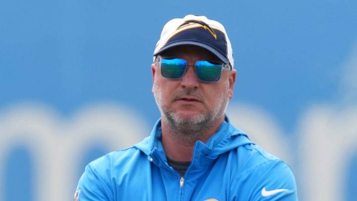 May 12, 2025; El Segundo, CA, USA; Los Angeles Chargers general manager Joe Hortiz watches as quarterback Justin Herbert takes the snap during offseason workouts at The Bolt. Mandatory Credit: Kirby Lee-Imagn Images May 12, 2025; El Segundo, CA, USA; Los Angeles Chargers general manager Joe Hortiz watches as quarterback Justin Herbert takes the snap during offseason workouts at The Bolt. Mandatory Credit: Kirby Lee-Imagn Images