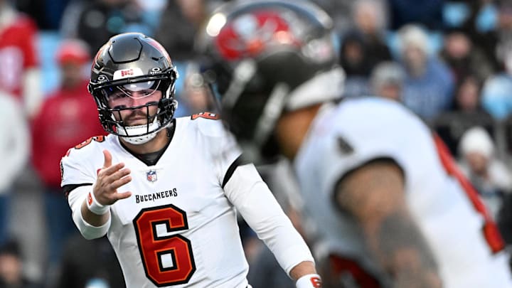 Tampa Bay Buccaneers quarterback Baker Mayfield signals to wide receiver Mike Evans