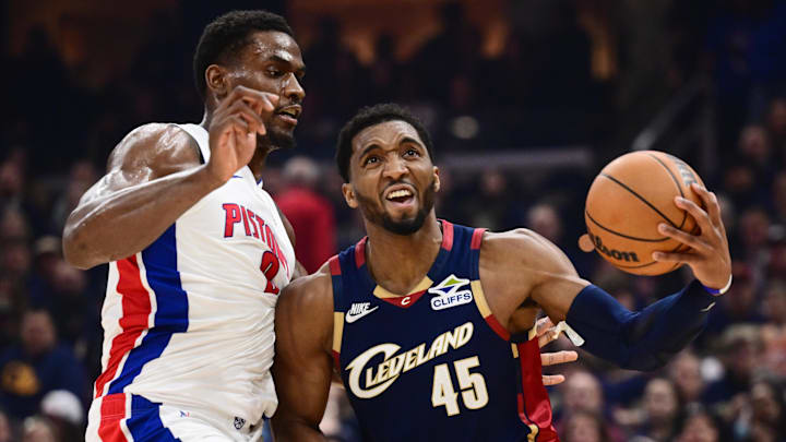 May 15, 2026; Cleveland, Ohio, USA; Cleveland Cavaliers guard Donovan Mitchell (45) drives to the basket against Detroit Pistons center Jalen Duren (0) during the first quarter in game six of the second round of the 2026 NBA Playoffs at Rocket Arena. Mandatory Credit: Ken Blaze-Imagn Images