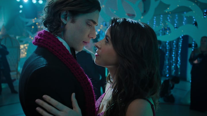 Hot Frosty. (L-R) Dustin Milligan as Jack Snowman and Lacey Chabert as Kathy Barrett in Hot Frosty. 