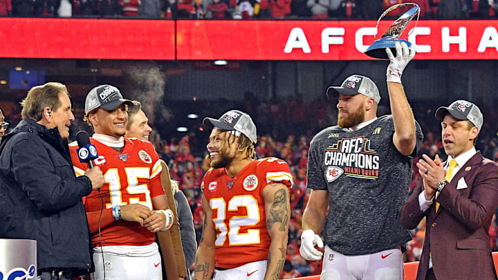 Jan 19, 2020; Kansas City, Missouri, USA; Kansas City Chiefs tight end Travis Kelce (87), Kansas City Chiefs strong safety Tyrann Mathieu (32) and quarterback Patrick Mahomes (15) celebrates with the Lamar Hunt Trophy after beating the Tennessee Titans in the AFC Championship Game at Arrowhead Stadium. Mandatory Credit: Denny Medley-Imagn Images