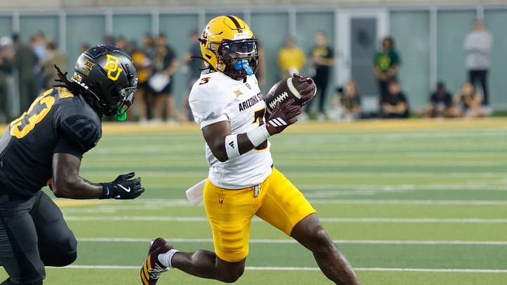 Arizona State Sun Devils running back Raleek Brown (3) carries the ball as Baylor Bears safety DJ Coleman (33) gives chase during the first half at McLane Stadium. Arizona State Sun Devils running back Raleek Brown (3) carries the ball as Baylor Bears safety DJ Coleman (33) gives chase during the first half at McLane Stadium.
