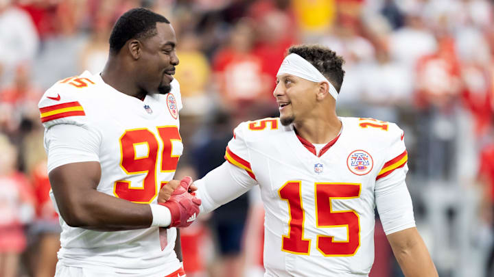 Aug 9, 2025; Glendale, Arizona, USA; Kansas City Chiefs defensive tackle Chris Jones (95) with quarterback Patrick Mahomes (15) against the Arizona Cardinals during a preseason NFL game at State Farm Stadium. Mandatory Credit: Mark J. Rebilas-Imagn Images