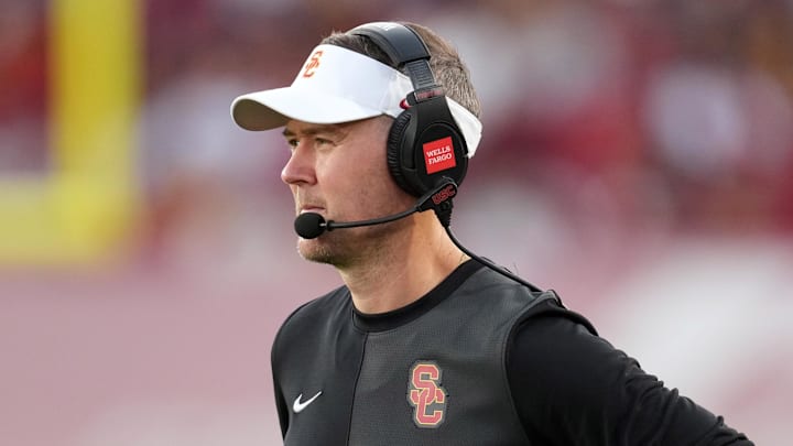Aug 30, 2025; Los Angeles, California, USA; Southern California Trojans head coach Lincoln Riley watches from the sidelines against the Missouri State Bears in the first half at United Airlines Field at Los Angeles Memorial Coliseum. Mandatory Credit: Kirby Lee-Imagn Images