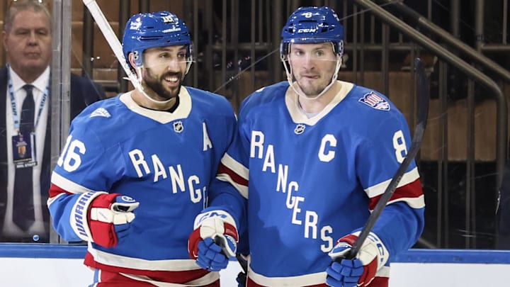 Jan 8, 2026; New York, New York, USA;  New York Rangers center Vincent Trocheck (16) celebrates with center J.T. Miller (8) after scoring a goal in the third period against the Buffalo Sabres at Madison Square Garden. Mandatory Credit: Wendell Cruz-Imagn Images