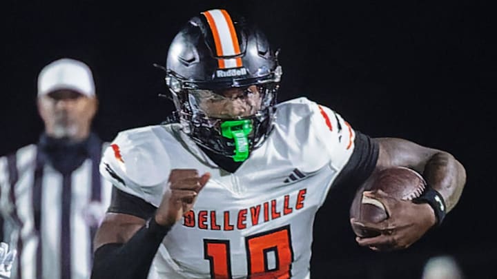 Belleville's Bryce Underwood carries the ball during a 30-29 loss to Howell Friday, Oct. 25, 2024 in Howell.