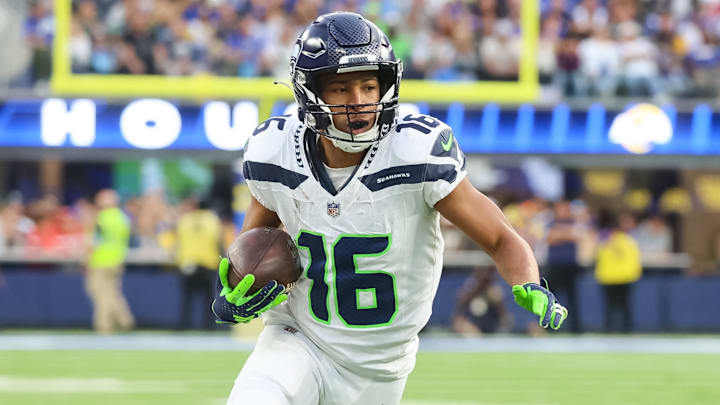 Jan 5, 2025; Inglewood, California, USA;  Seattle Seahawks Wide Receiver Tyler Lockett (16) runs down the field baseline at SoFi Stadium for the Seattle Seahawks at Los Angeles Rams Week 18 matchup. Mandatory Credit: William Navarro-Imagn Images