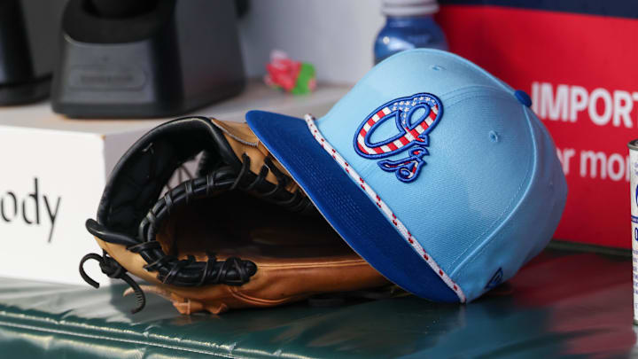 Jul 4, 2025; Atlanta, Georgia, USA; A detailed view of the Baltimore Orioles 4th of July hat in the dugout against the Atlanta Braves in the third inning at Truist Park. Jul 4, 2025; Atlanta, Georgia, USA; A detailed view of the Baltimore Orioles 4th of July hat in the dugout against the Atlanta Braves in the third inning at Truist Park.