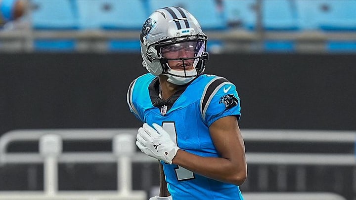 Aug 2, 2025; Charlottle, NC, USA; Carolina Panthers wide receiver Tetairoa McMillan (4) runs a pass route during Fanfest at Bank of America Stadium. Mandatory Credit: Jim Dedmon-Imagn Images