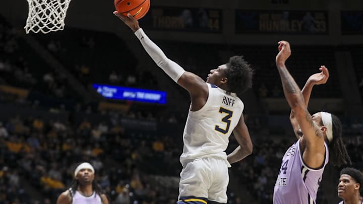 Jan 27, 2026; Morgantown, West Virginia, USA; West Virginia Mountaineers guard Honor Huff (3) drives down the lane and shoots during the second half against the Kansas State Wildcats at Hope Coliseum. Mandatory Credit: Ben Queen-Imagn Imagesa