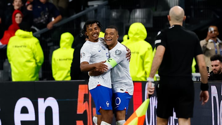 PSG's Kylian Mbappe & Barcelona's Jules Kounde.