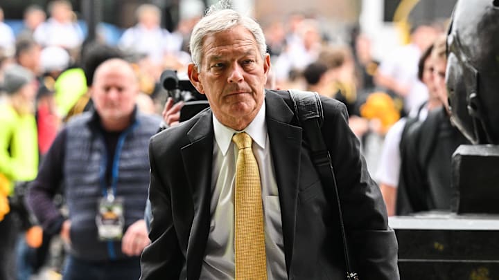 Nov 2, 2024; Iowa City, Iowa, USA; Iowa Hawkeyes head coach Kirk Ferentz enters Kinnick Stadium before the game against the Wisconsin Badgers. Mandatory Credit: Jeffrey Becker-Imagn Images