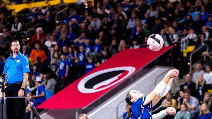 Ankeny Christian's Katie Quick (2) makes a save during the Class 1A IGHSAU Iowa Girls High School Athletic Union state volleyball championship match between Ankeny Christian and Holy Trinity Catholic, Thursday, Nov. 2, 2023, at Xtream Arena in Coralville, Iowa.