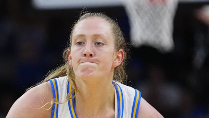 UCLA forward Lauren Betts (51) and guard Gianna Kneepkens (8) celebrate against Texas at Mortgage Matchup Center during a Final Four semifinal game in Phoenix on April 3, 2026.