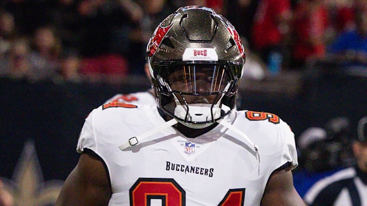 Oct 13, 2024; New Orleans, Louisiana, USA;  Tampa Bay Buccaneers defensive tackle Calijah Kancey (94) run on the field against the New Orleans Saints during the first half at Caesars Superdome. Mandatory Credit: Stephen Lew-Imagn Images